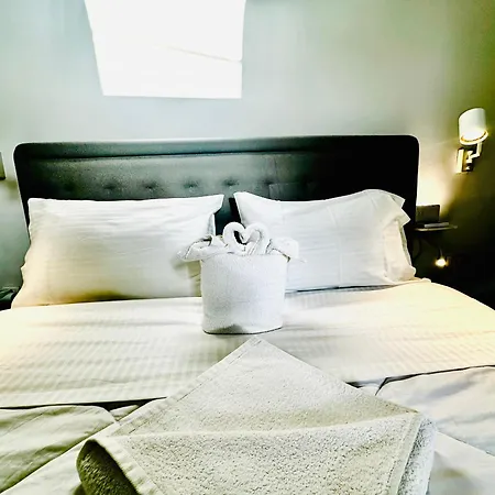 Travelers Luxury Suites, & *